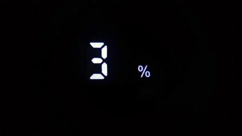 Battery charge level indicator charging process close-up macro 스톡 동영상 201343077