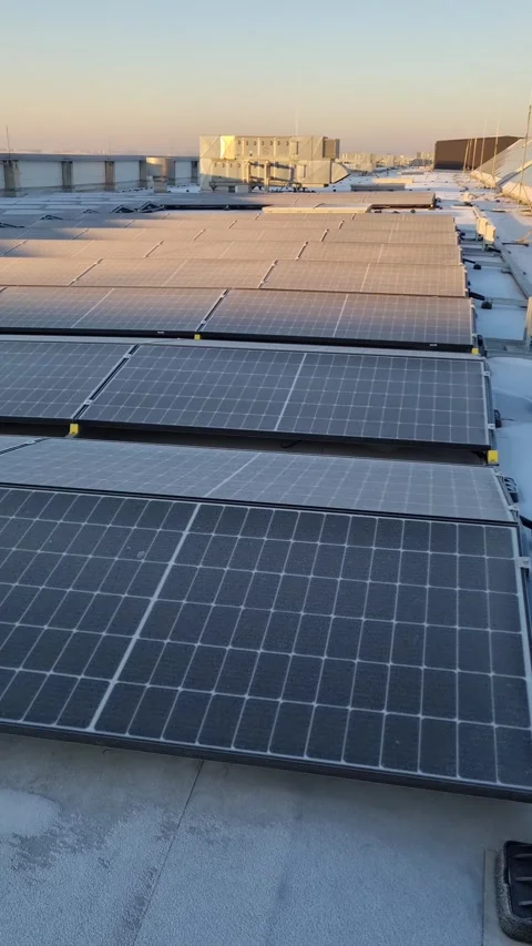 The battery is charged from a solar cell in winter. Green energy concept Stock Footage 265799356