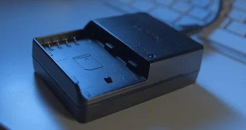 Battery charger close-up 4K, plug in and out Stock Footage 97089910