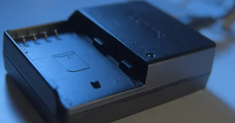 Battery charger close-up 4K, plug in and out Stock Footage 97089947