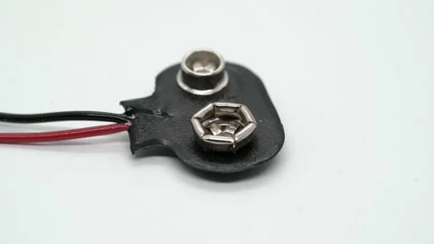 Battery connector box for 9V cells. Rotate at white isolated background. Vídeo Stock 169320568