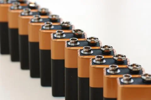 Battery electronic top row volt batteries copper Stock Photos