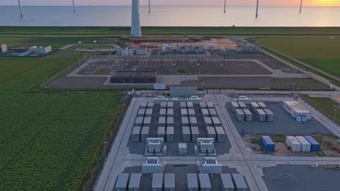 Battery energy storage system plant with offshore wind turbines Stock Footage 341875868