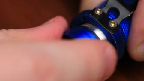 The Battery Fits into the Flashlight Stock Footage 256099769