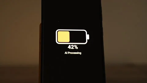 A battery icon labeled AI Processing drains from 100 percent down to 40 percent Stock-Footage 347516381