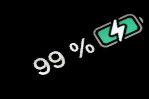 Battery level indicator charging process - white number: ninety-nine, 99 percent Stock Photos