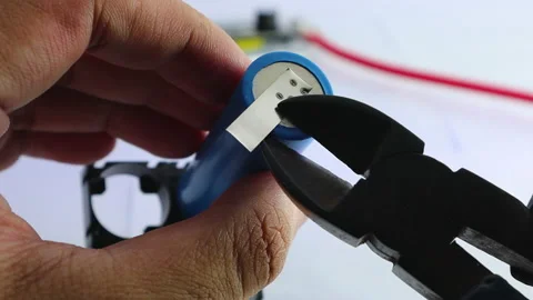Battery lithium-ion 18650 is spot welded Stock Footage 165967944