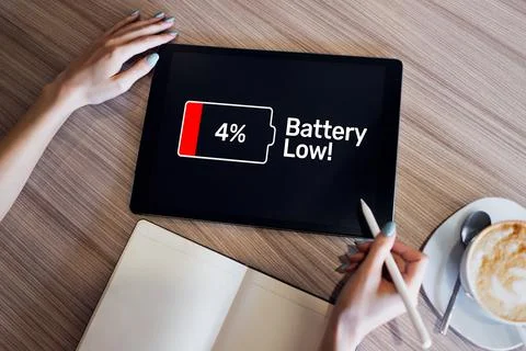 Battery low message on mobile device screen. Internet and technology concept 스톡 사진