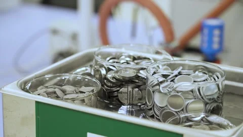 Battery material samples undergoing laboratory quality and purity testing in an Stock Footage 345224454