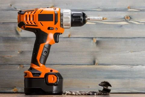 Battery powered drill and drill bits Stock Photos