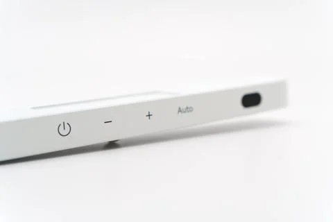 Battery powered motion sensor LED lamp for indoor use in home setting Stock Photos