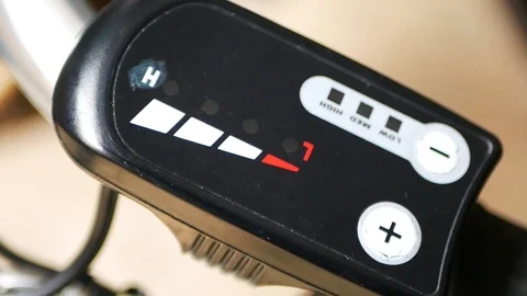 Battery status indicator panel on electric bike bar handle. Stock Footage 119306750