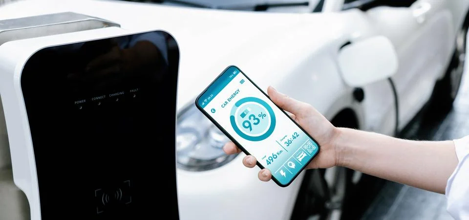 Battery status interface on smartphone for progressive future refueling concept. Stock Photos