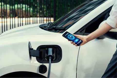 Battery status interface on smartphone for progressive future refueling concept. Stock Photos