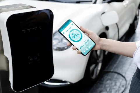 Battery status interface on smartphone for progressive future refueling concept. Stock Photos