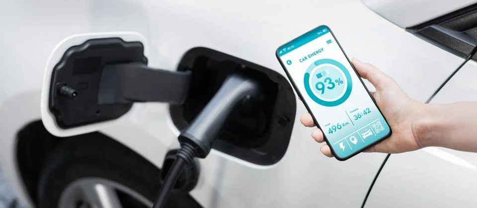 Battery status interface on smartphone for progressive future refueling concept. Stock Photos