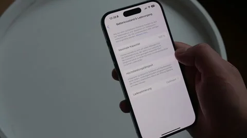Battery status on iPhone. iPhone Settings. Video stock 258270371