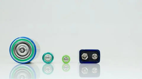 Battery type D or C, PP3, AA, AAA on a white background with reflection. View Stock-Fotos