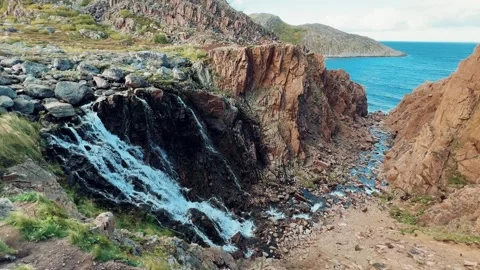 Battery waterfall in Teriberka.  Stock Footage 272578918