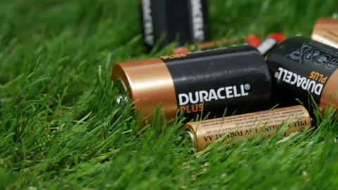 Battery's Power Cell Lying On Grass Stock Footage 160995429