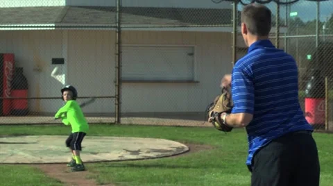 Batting Practice Dad and Boy Stock Footage 45529965