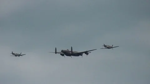 Battle of Britain Memorial Flight formation display Lancaster Spitfire Hurricane Stock Footage 83598998