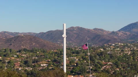 Battle Mountain Cross Mountain Flag Close Up Spin Around Stock Footage 329948607