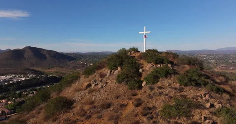 Battle Mountain Cross Mountain Flag Wide Front Pass Stock Footage 329948985