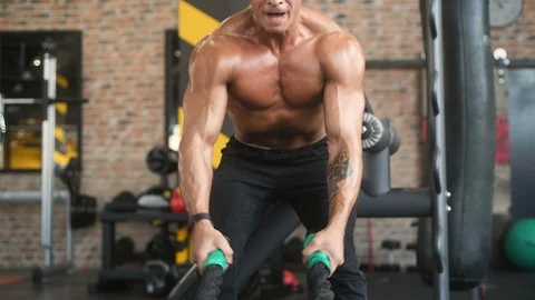 Battle ropes intense workout Stock Footage 105634240