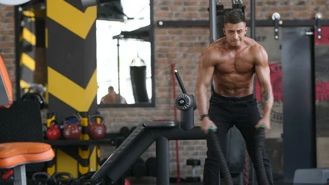 Battle ropes intense workout Stock Footage 105635447