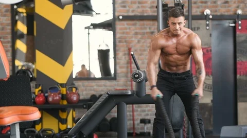 Battle ropes intense workout Stock Footage 105635672