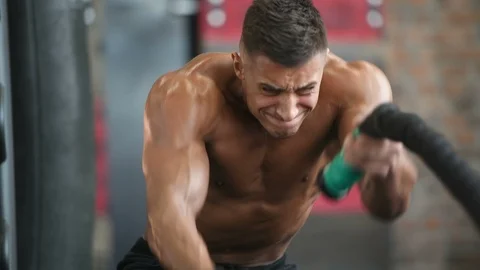 Battle ropes intense workout Stock Footage 105637368