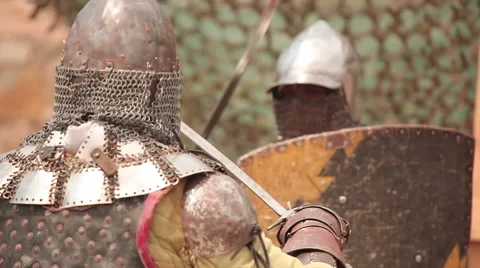 Battle of two knights with swords Stock Footage 60563574