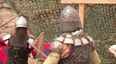 Battle of two knights with swords shields Stock Footage 60696480