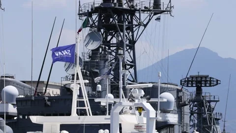 Battleship with Waving Flag in Naples Stock Footage 302880787