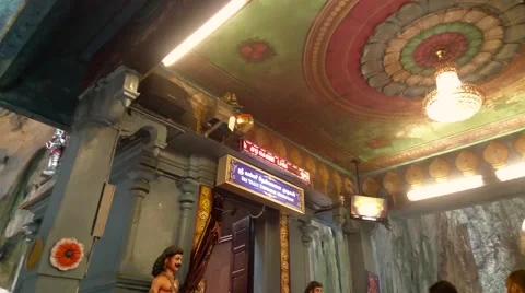 Batu Caves - Devotees Praying In Inner Temple, Pan Right Video stock 56059024
