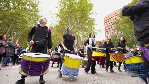 Batucada members playing drums during Pro-Palestine March in Madrid Stock Footage 254366932