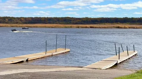 BAUDETTE, MN - 13 OCT 2025: Boat landing on the Rainy River Stock Footage 320190520