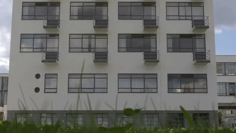 Bauhaus building view through the grass. September 2017 Stock Footage 83633868