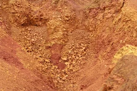 Bauxite mine raw bauxite on surface Stock Photos