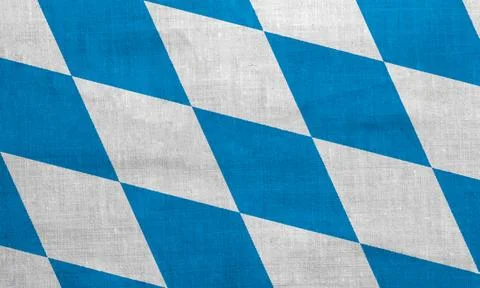 Bavaria flag pattern diamond-shaped version on fabric texture, retro vintage  Stock Photos
