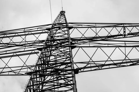 Bavaria, Germany - 28 Juny 2020: Electricity pylon from below siluette.  Stock Photos