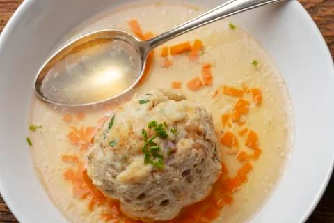 Bavarian bacon dumpling in a broth Stock Photos