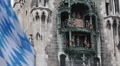 Bavarian Flag Tourists Attraction Glockenspiel Chimes Music Munich New Town Hall HD Footage