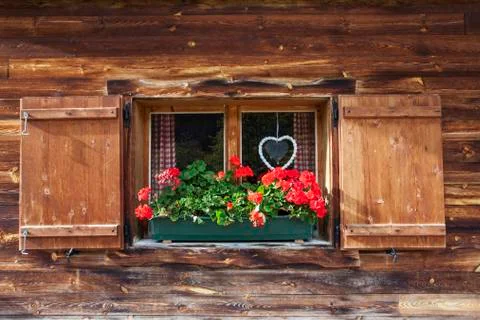 Bavarian window with geranium Stock Photos