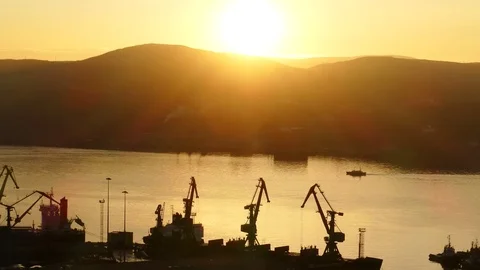 Bay and seaport on the background setting behind the mountains sun. Stock Footage 83159743