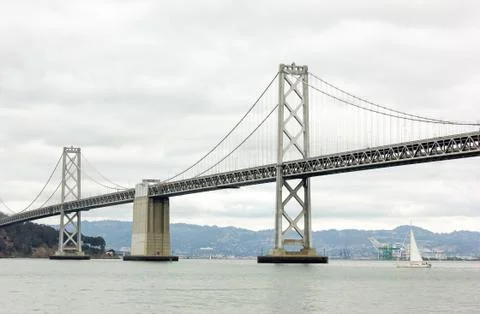 Bay Bridge in the cloudy day. Stock Photos