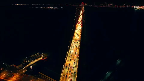 Bay Bridge span with heavy traffic at night, San Francisco Bay Stock Footage 337462764
