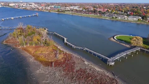 Bay City Loop and Bigelow Park, Bay City, Michigan on Saginaw River in aerial Stock Footage 332509760