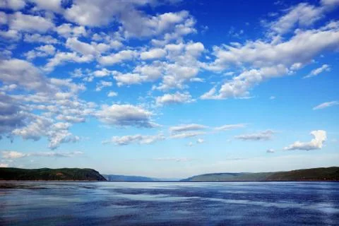 Bay with cloudy sky Stock Photos